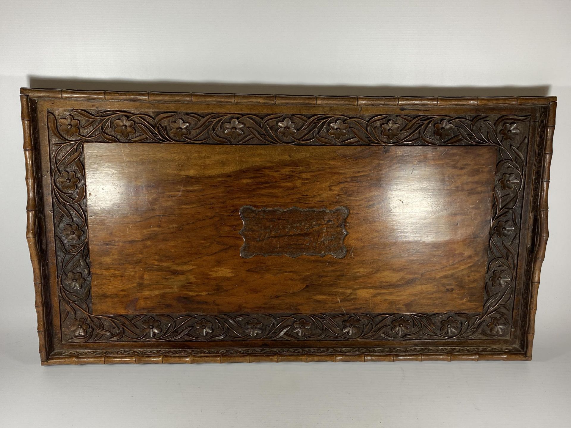 A BAMBOO EFFECT CARVED WOODEN CHINESE DRINKS TRAY, 78 X 42CM