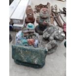 FIVE VARIOUS RECONSTITUTED STONE GARDEN FIGURES TO INCLUDE A GNOME AND HEDGEHOG ON A MOTORBIKE ETC