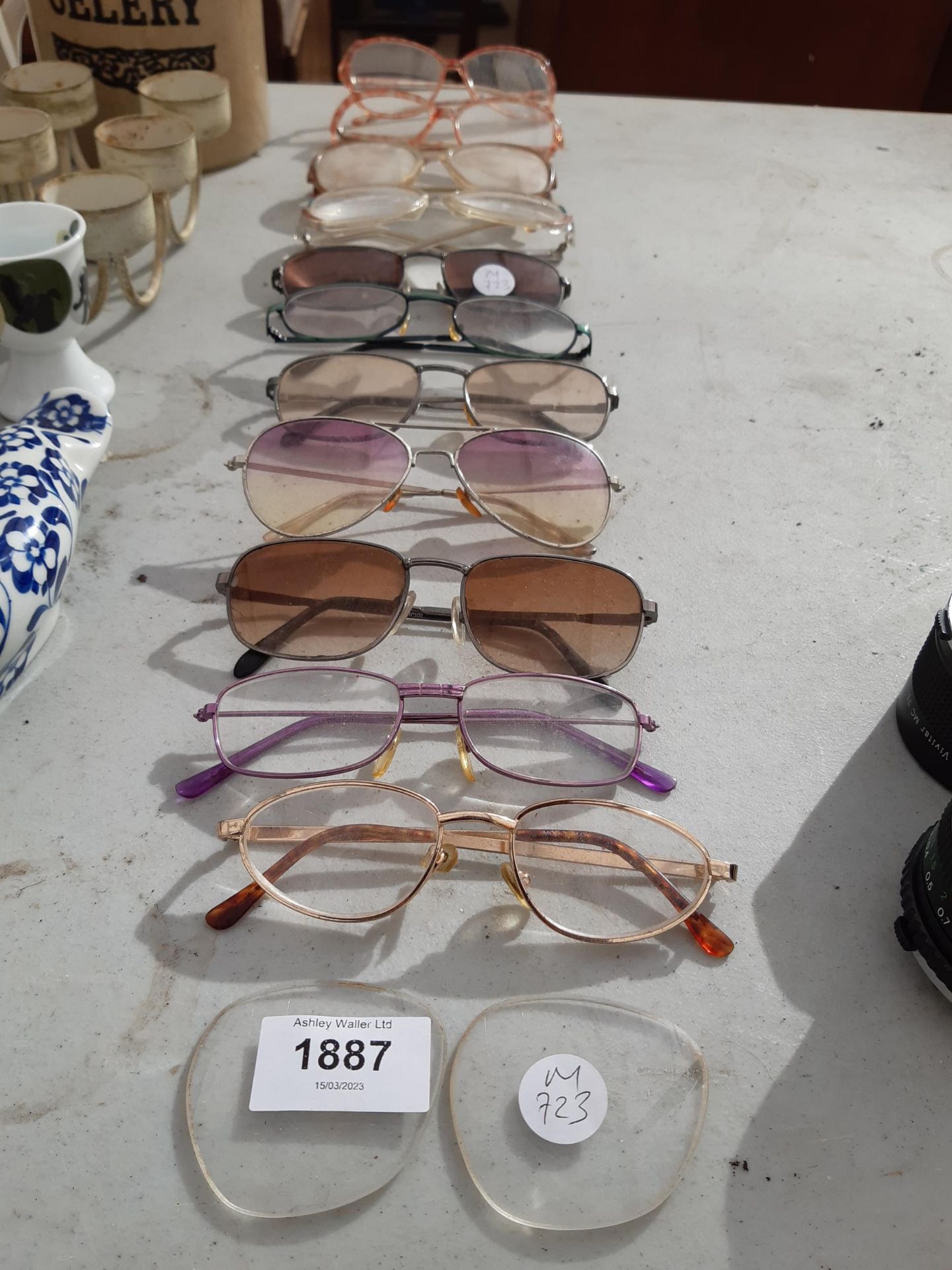 AN ASSORTMENT OF GLASSES AND SUN GLASSES ETC