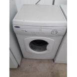 A WHITE HOTPOINT TUMBLE DRYER