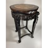 A CHINESE CARVED ROSEWOOD AND MARBLE TOPPED JARDINIERE STAND, HEIGHT 62CM