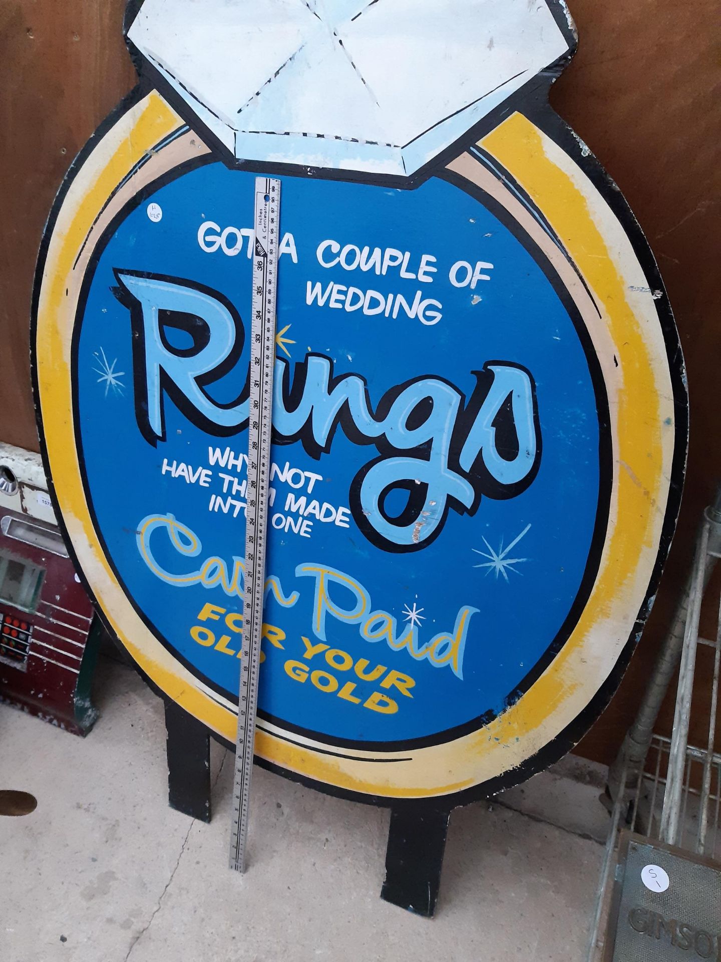 A WOODEN HAND PAINTED RING ADVERTISING SIGN - Image 4 of 4