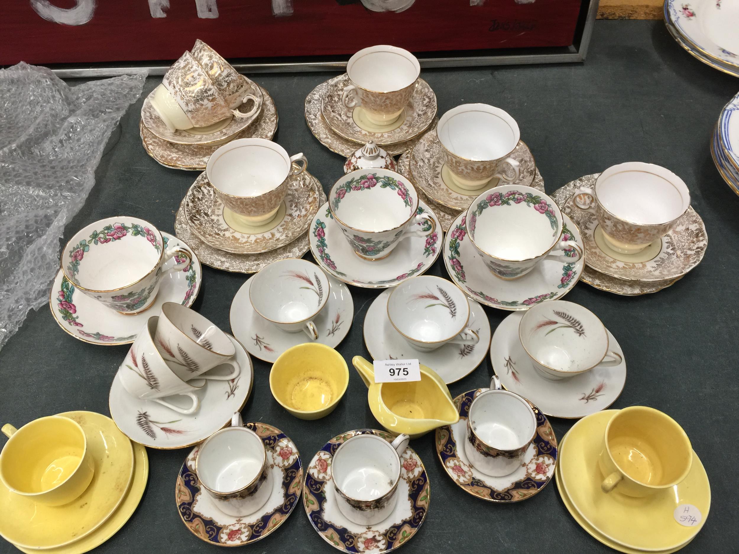 A LARGE QUANTITY OF CUPS, SAUCERS AND SIDE PLATES TO INCLUDE PORCELAINE DU BERRY, LIMOGES, ARGYLE