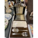 A BOXED SET OF FISH KNIVES AND FORKS AND A BOXED SERVING SET