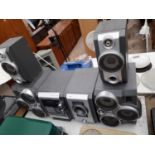 A SAMSUNG STEREO SYSTEM WITH A SUB WOOFER AND FOUR LARGE SPEAKERS