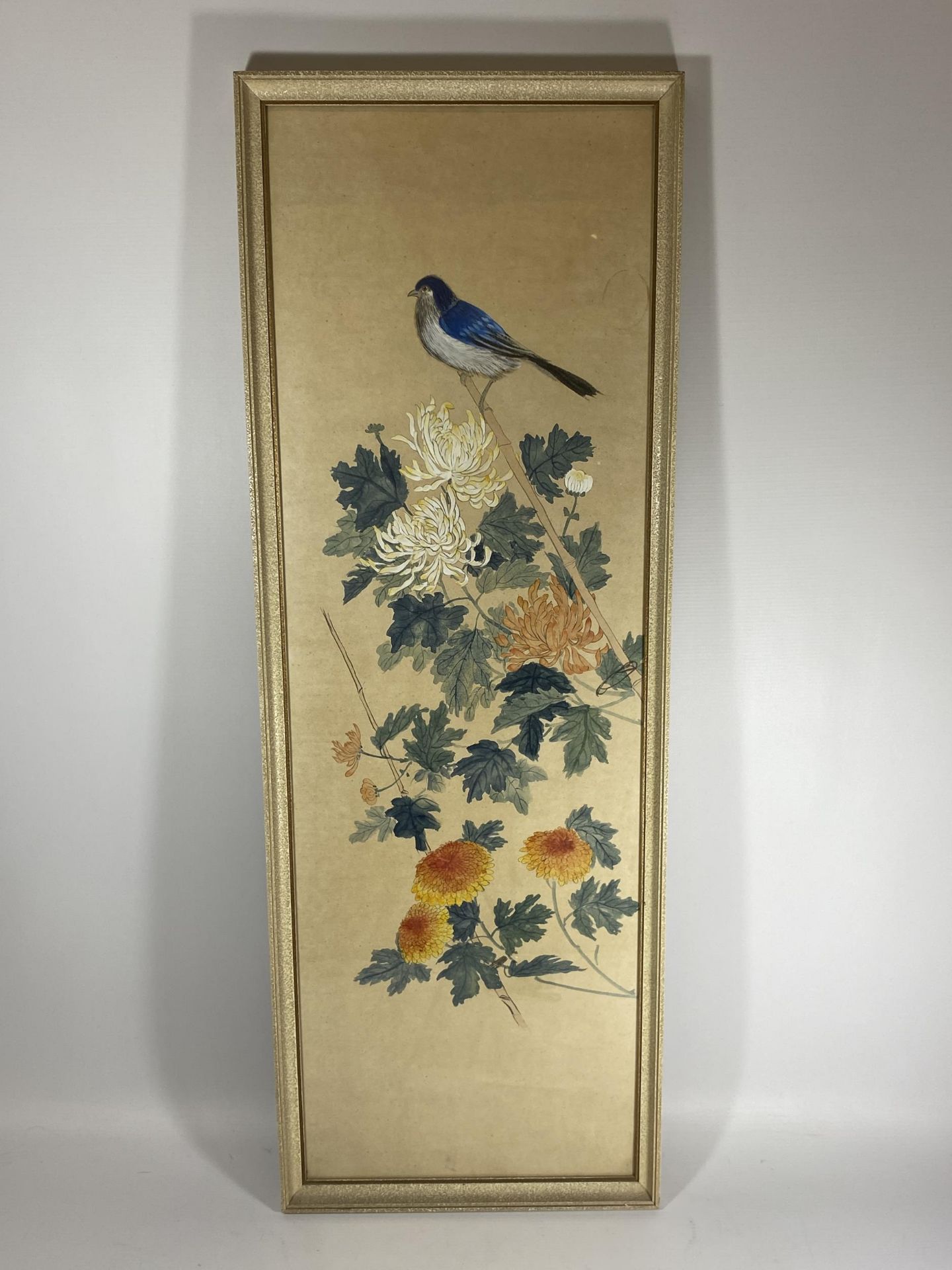 A FRAMED ORIENTAL WATERCOLOUR ON RICE PAPER DEPICTING A BIRD, UNSIGNED, 94 X 33CM