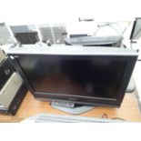 A PANASONIC 26" TELEVISION WITH REMOTE CONTROL