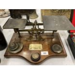 A SET OF VINTAGE POSTAL SCALES WITH WEIGHTS