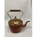 A COPPER AND BRASS KETTLE HEIGHT 25CM