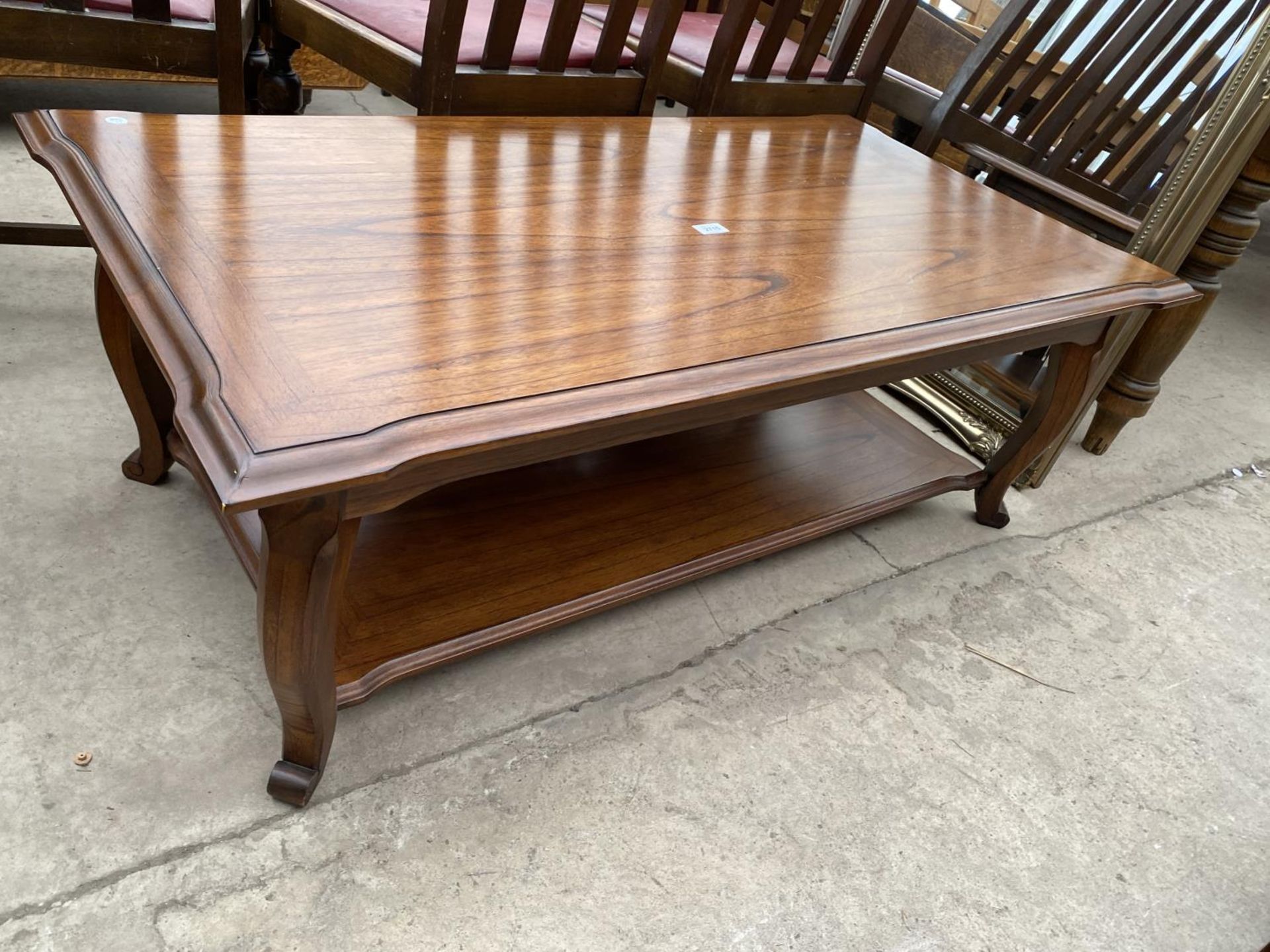 A MODERN HARDWOOD TWO TIER COFFEE TABLE WITH END PULL-OUT SLIDES, 47X25"