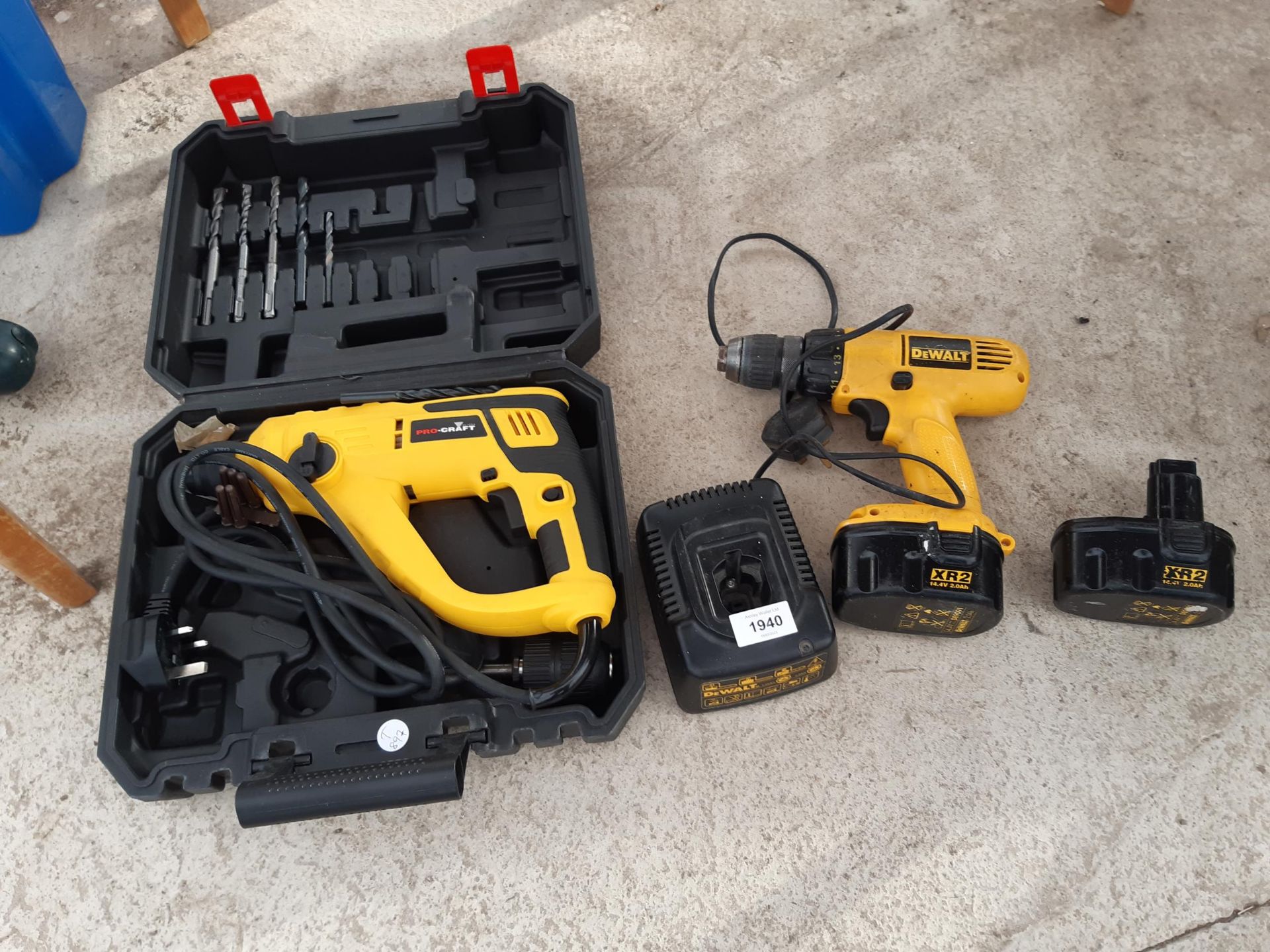 AN ASSORTMENT OF POWER TOOLS TO INCLUDE A PROCRAFT DRILL AND A DEWALT BATTERY DRILL