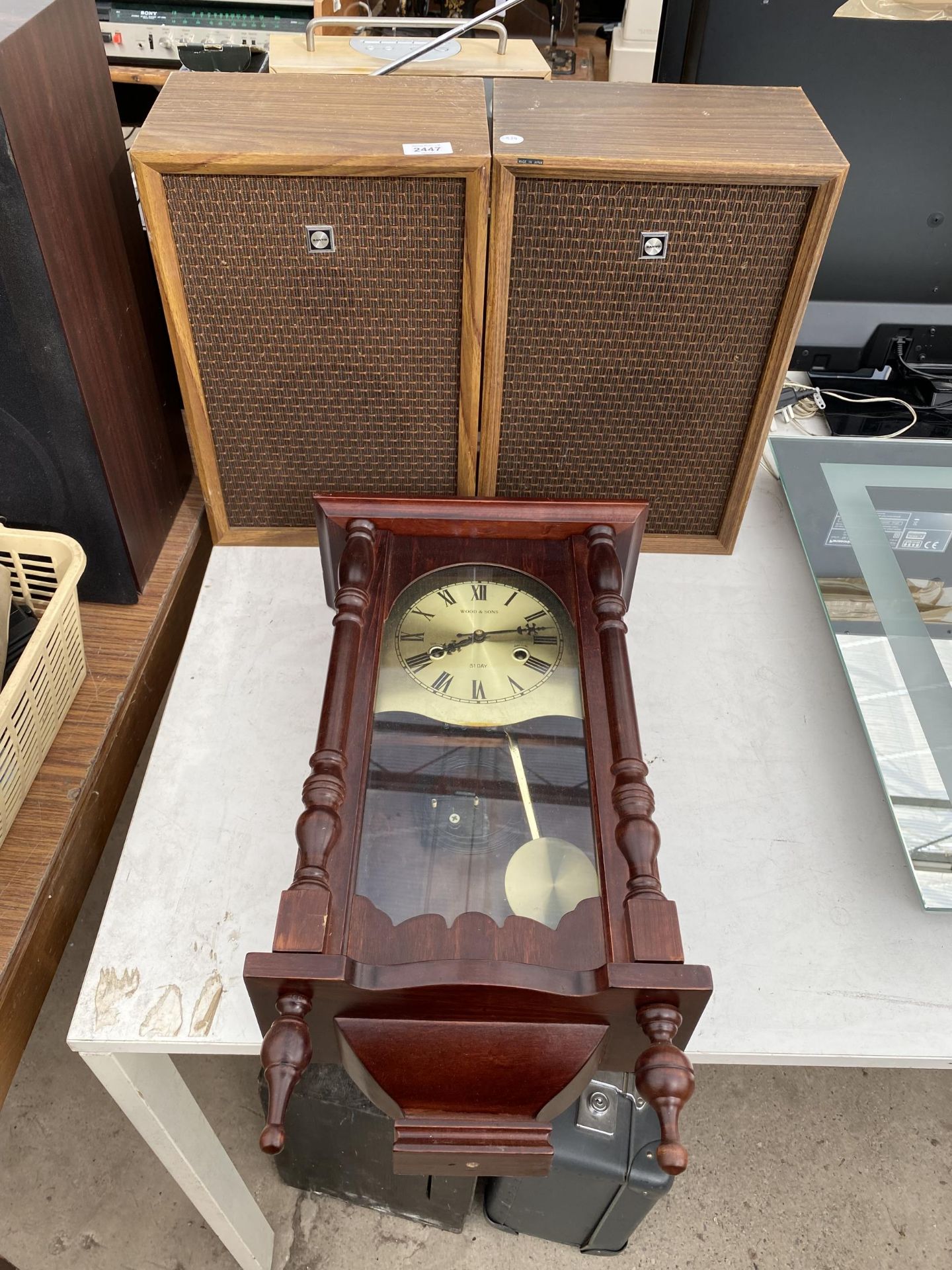 TWO SANYO WOODEN CASED SPEAKERS AND A VIENNA STYLE WALL CLOCK