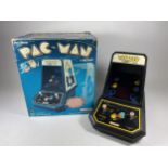 A BOXED RETRO COLECO PAC MAN BY MIDWAY ARCADE GAME