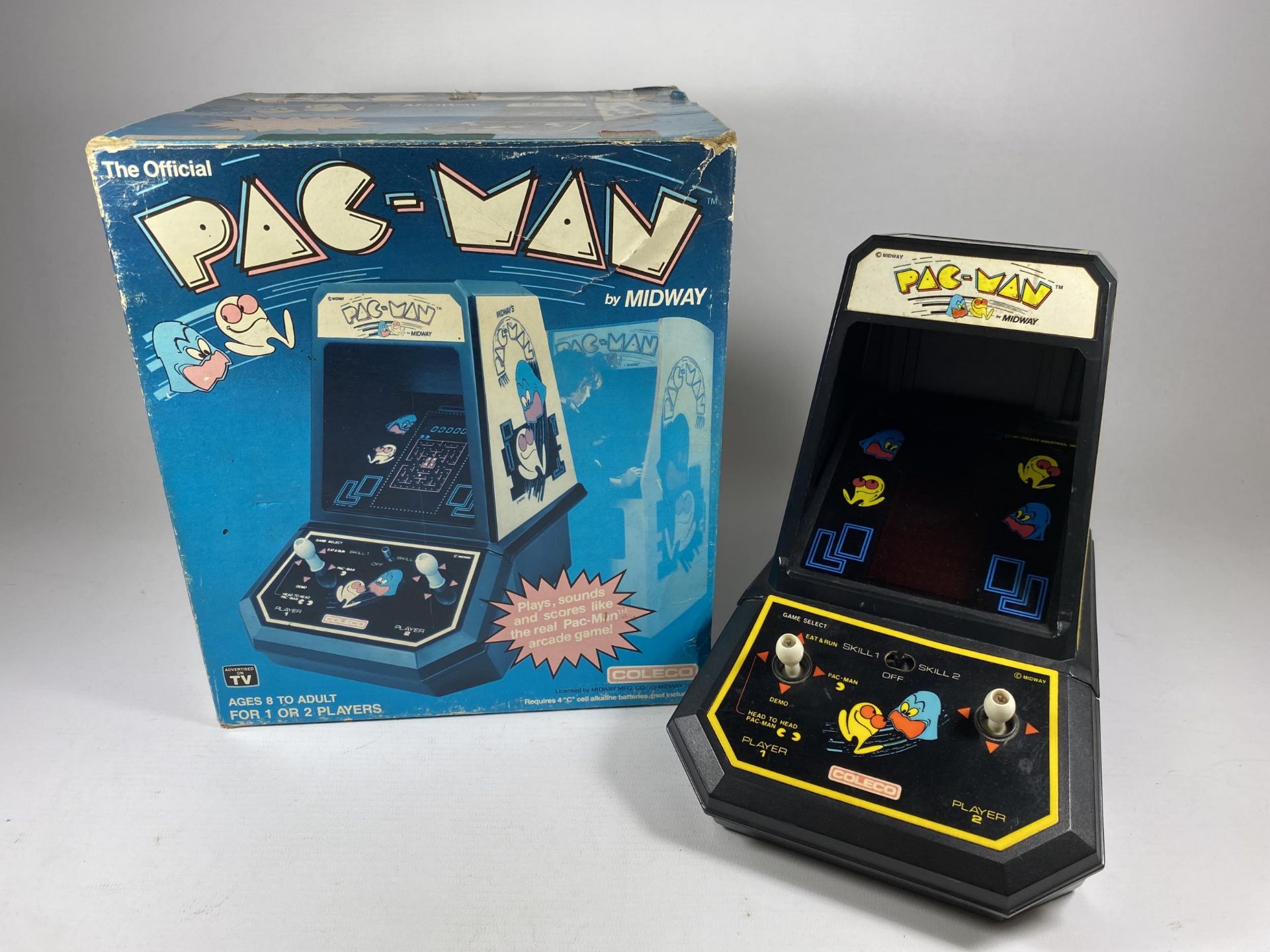 A BOXED RETRO COLECO PAC MAN BY MIDWAY ARCADE GAME