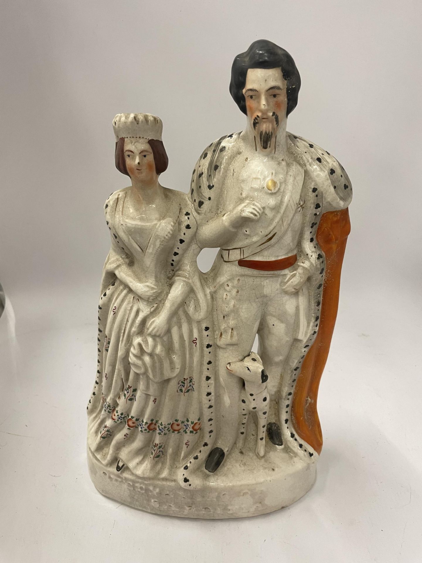 A STAFFORDSHIRE POTTERY FIGURE OF QUEEN VICTORIA AND VICTOR EMMANUEL II, QUEEN & KING OF SARDINIA