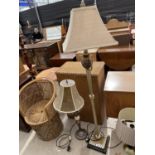 A METALWARE STANDARD LAMP COMPLETE WITH SHADE AND TALL TABLE LAMP COMPLETE WITH SHADE