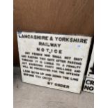 A CAST IRON 'LANCASHIRE & YORKSHIRE RAILWAY NOTICE' SIGN (59CM x 52CM)