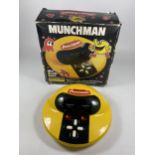 A BOXED RETRO GRANDSTAND MUNCHMAN MINI ARCADE GAME