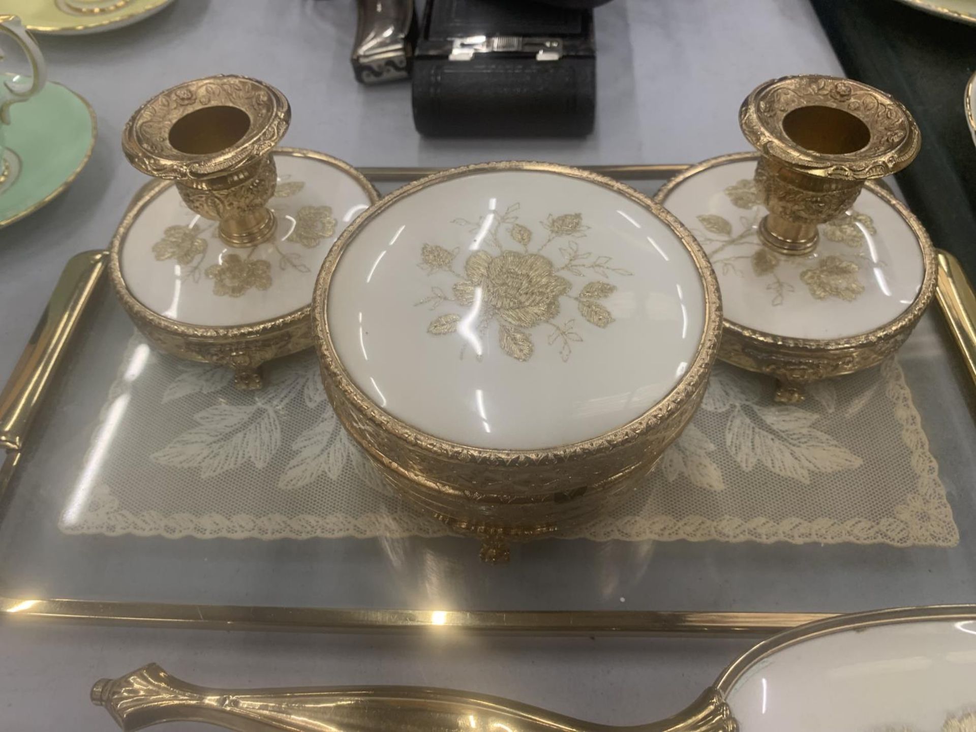 A VINTAGE DRESSING TABLE SET TO INCLUDE A GLASS TRAY, CANDLESTICKS, TRINKET BOX, BRUSHES AND HAND - Image 2 of 4