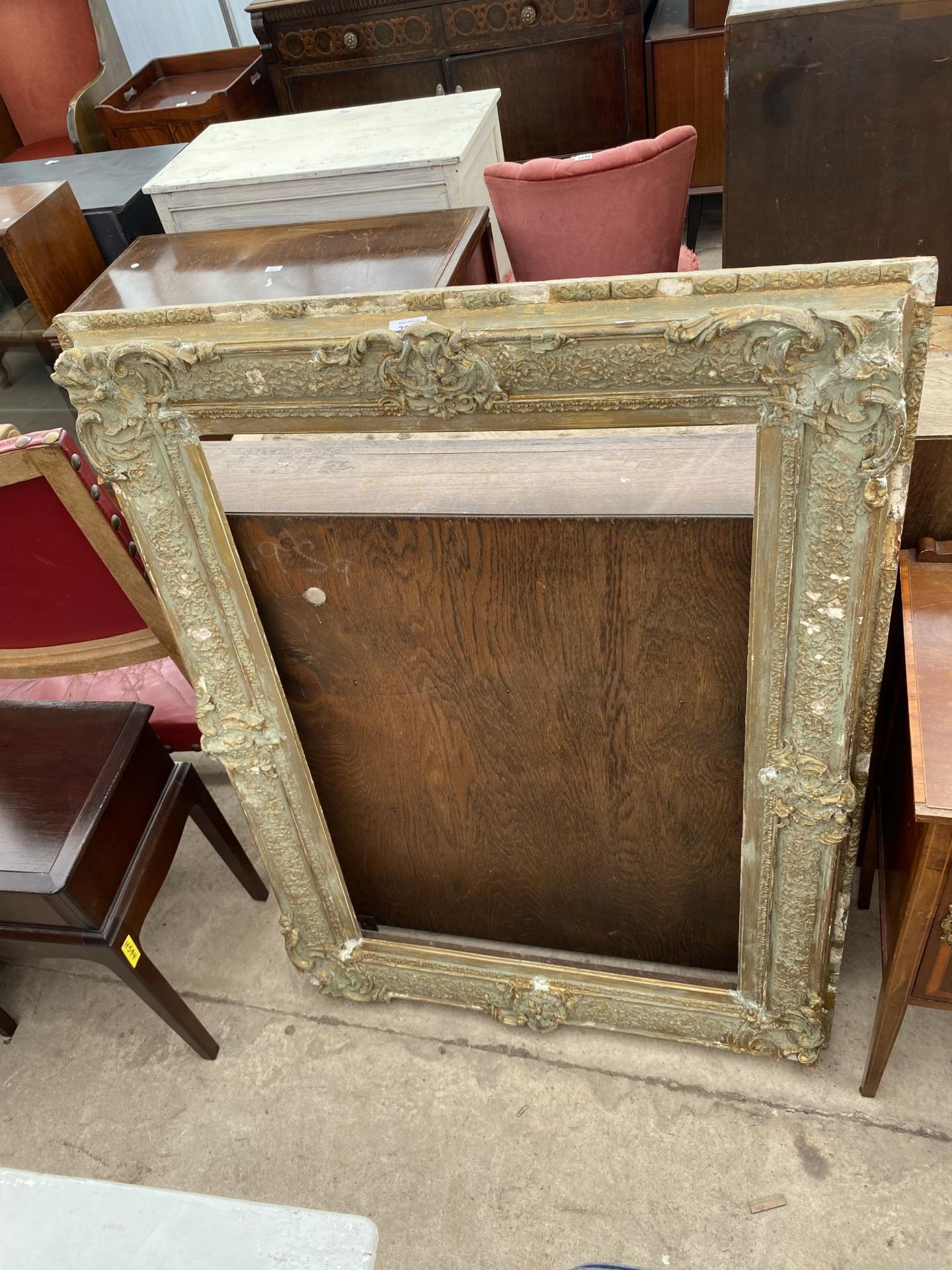 A GILT PICTURE FRAME, 46X34"