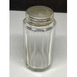 A HALLMARKED SILVER LIDDED JAR