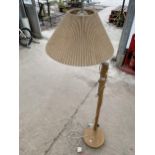 A RETRO WOODEN FLOOR LAMP