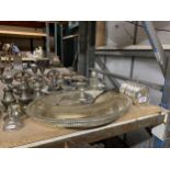 A QUANTITY OF SILVER PLATE TO INCLUDE TRAYS, CANDLEABRA'S, SALT & PEPPER, FLOUR SHAKER, ETC.,