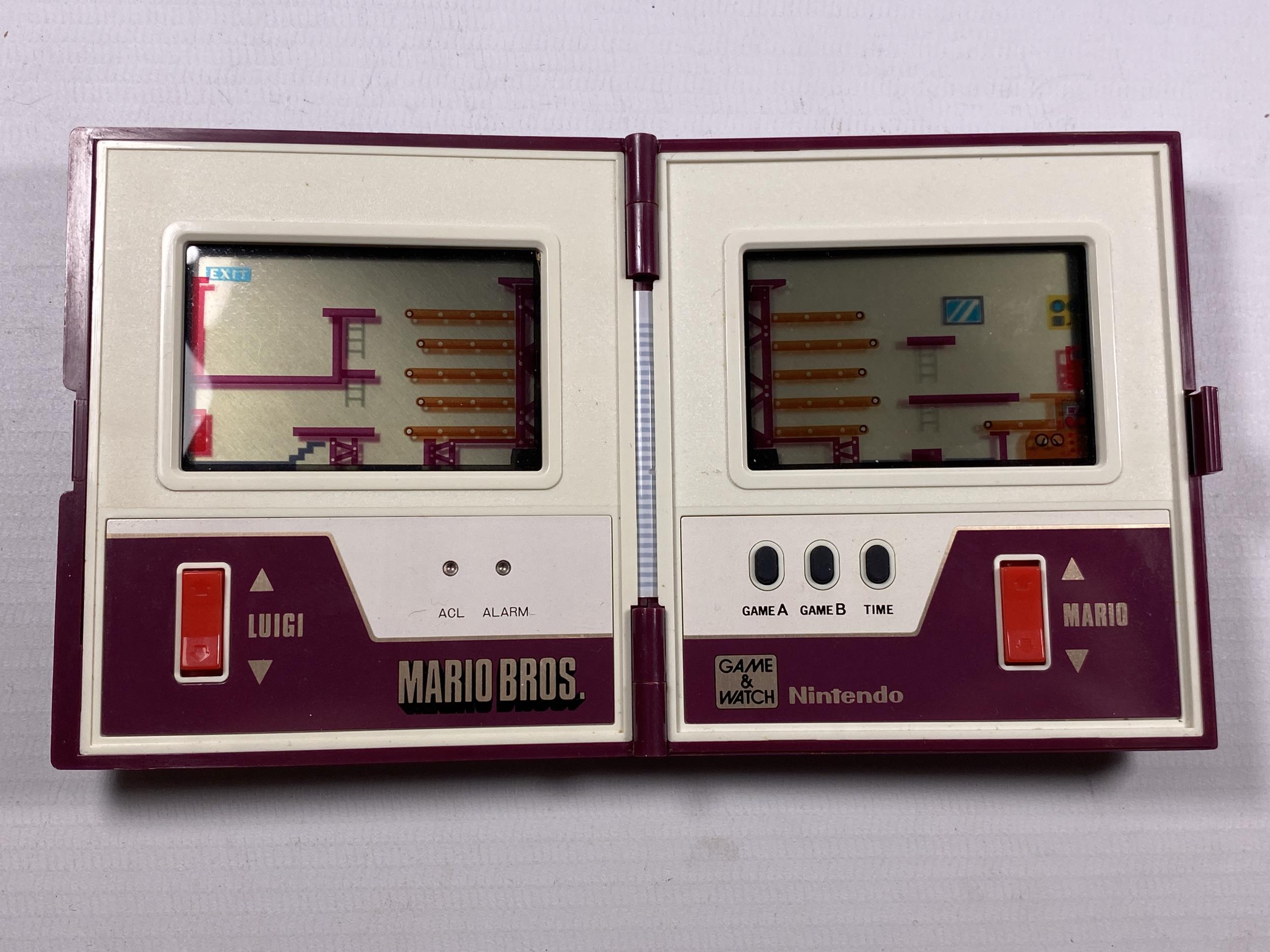 A RETRO NINTENDO MARIO BROS GAME & WATCH