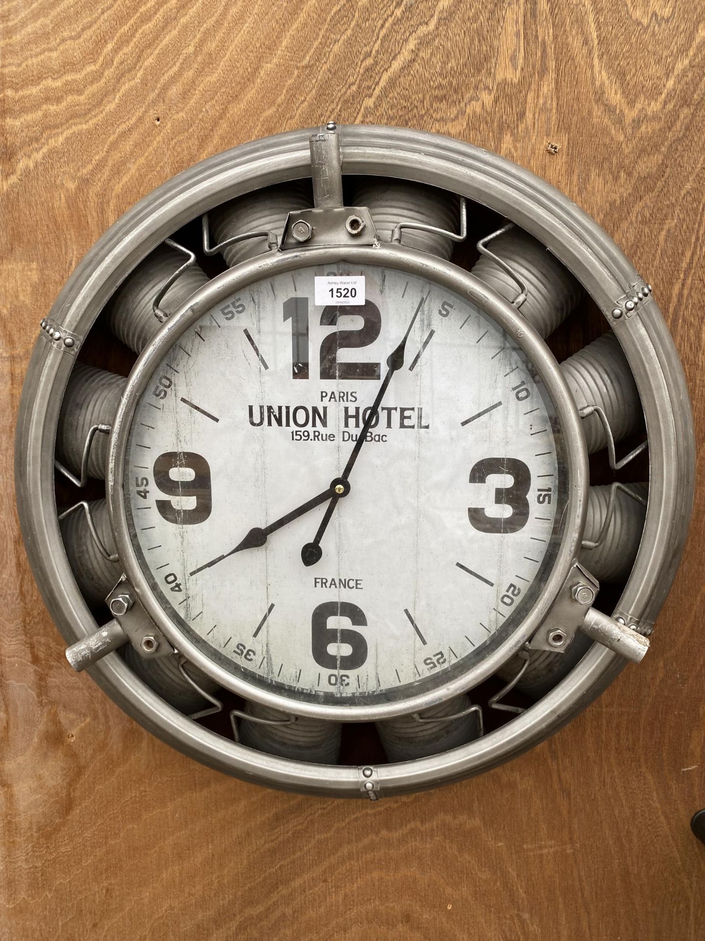 AN INDUSTRIAL STYLE WALL CLOCK