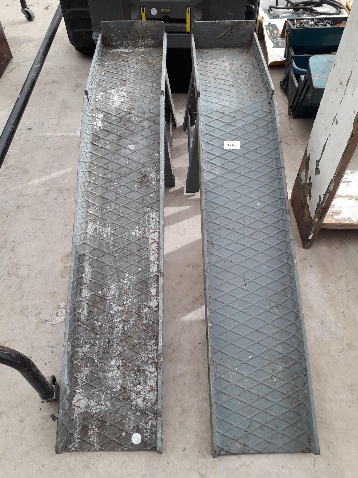 A PAIR OF STEEL CAR RAMPS