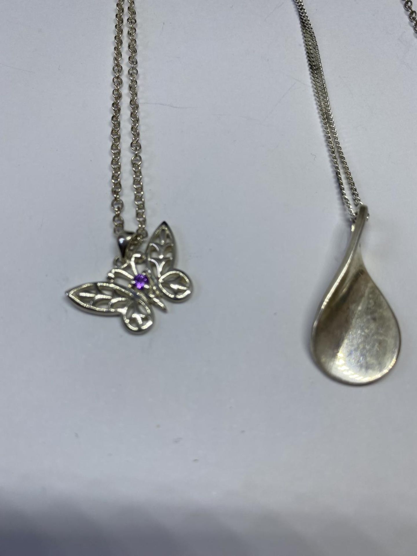 FOUR SILVER NECKLACES WITH PENDANTS - Image 2 of 3