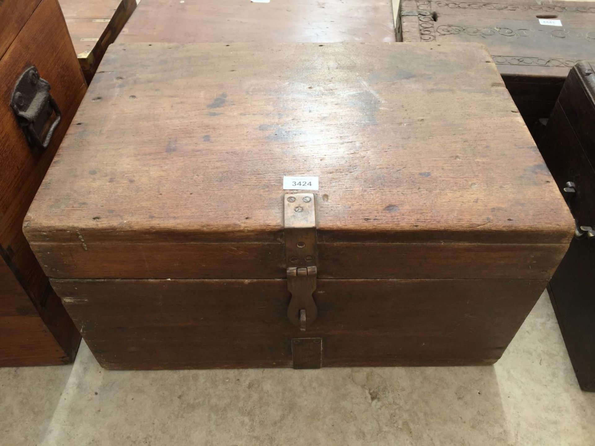 AN INDIAN HARDWOOD WRITING BOX WITH BRASS FITTINGS, 22" WIDE