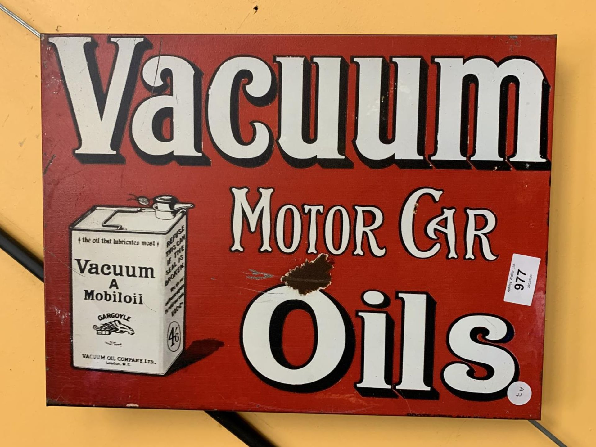 A VACUUM MOTOR CAR OILS METAL SIGN