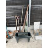 AN ASSORTMENT OF GARDEN TOOLS TO INCLUDE A SAW, SPADE, ETC