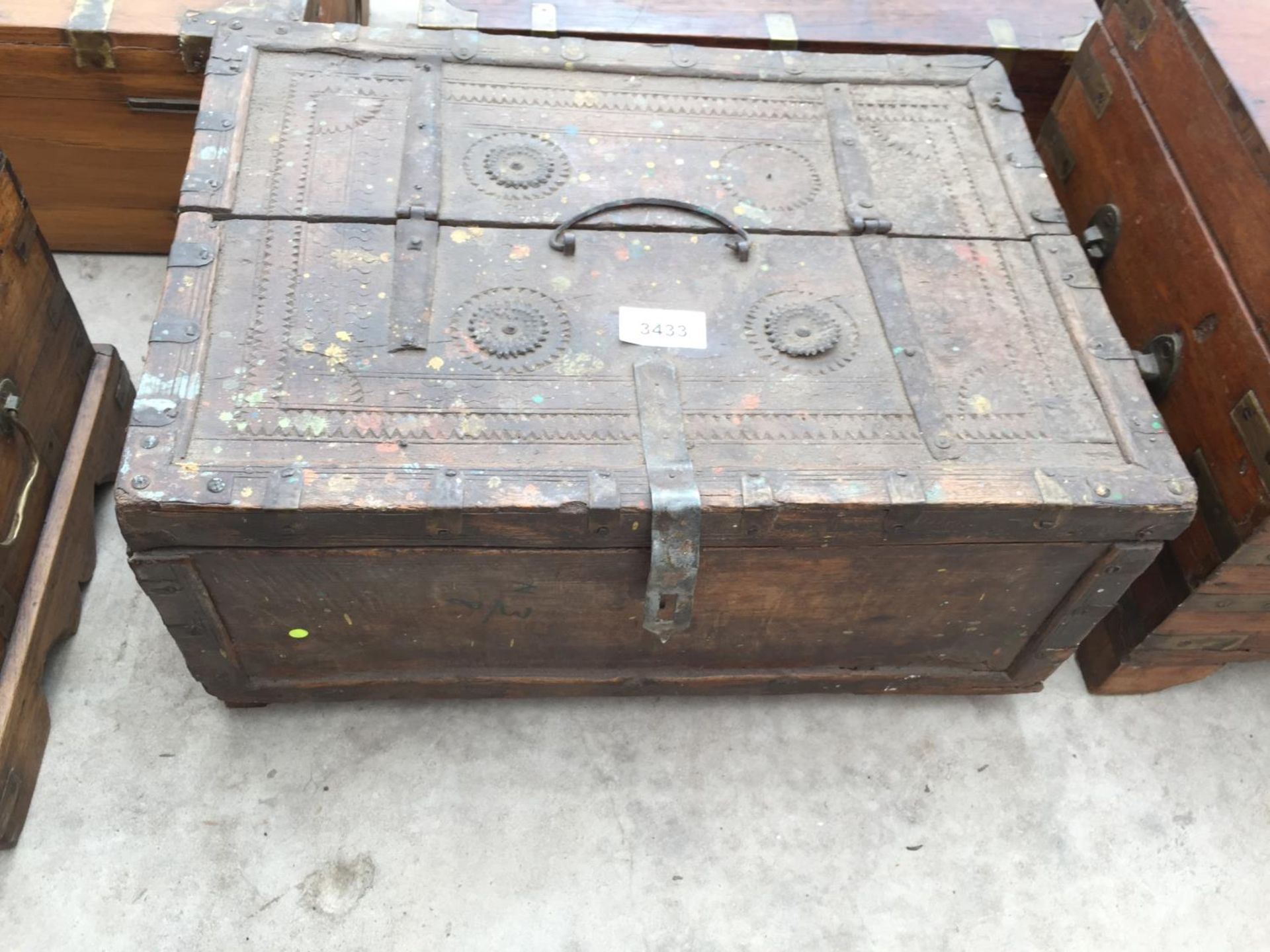 AN INDIAN HARDWOOD BOX WITH METAL STRAPWORK + DECORATION, 17" WIDE