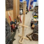 A LARGE WOODEN ARTIST EASEL