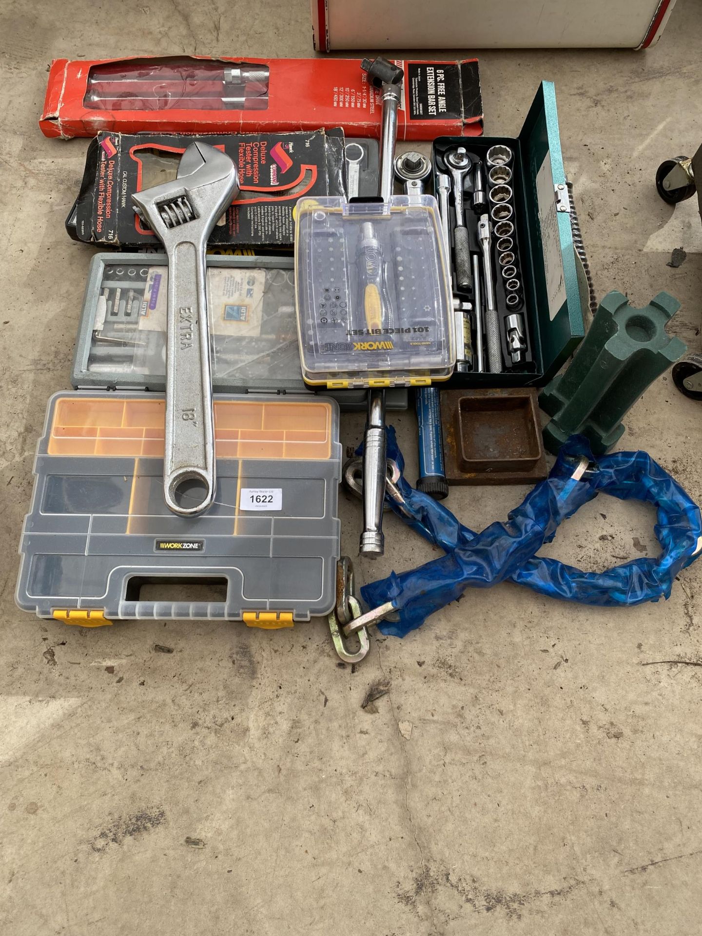 AN ASSORTMENT OF TOOLS TO INCLUDE SPANNERS AND SOCKET SETS ETC