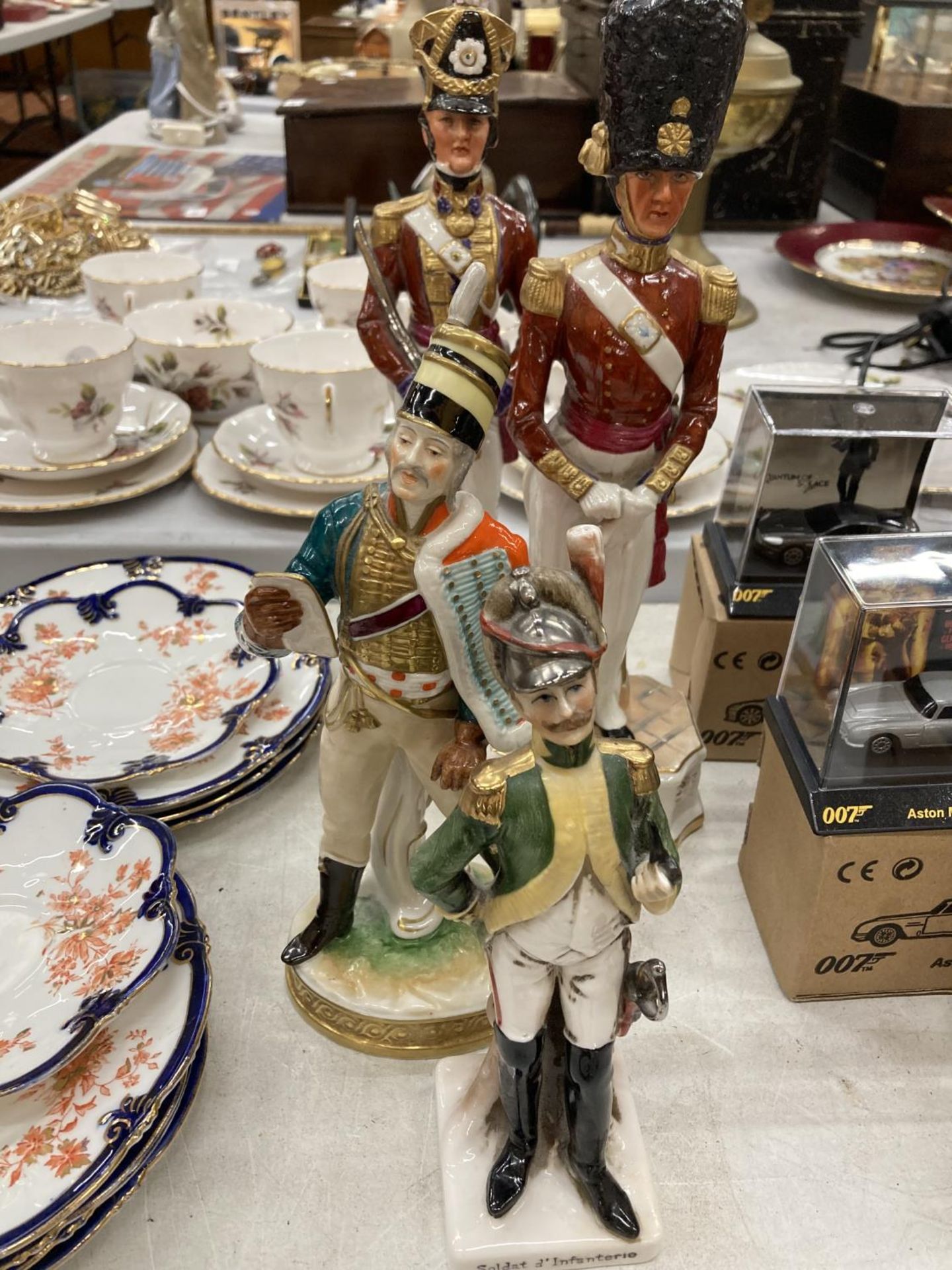 FOUR CERAMIC SOLDIER FIGURES TO INCLUDE OFFICER 3RD GUARDS REGIMENT, OFFICER SCOTS FUSILIER