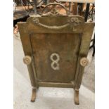 A BRASS AND COPPER ARTS AND CRAFTS FIRE SCREEN