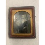 A VICTORIAN MINIATURE FRAMED PHOTOGRAPH 6.5CM X 7.5CM