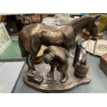 A VINTAGE BRONZE EFFECT MODEL OF A BLACKSMITH WITH HORSE