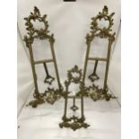 THREE ORNATE VINTAGE BRASS TABLE TOP EASEL DISPLAYS, HEIGHT OF LARGE PAIR 53CM