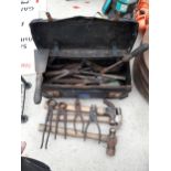 A TOOL BAG CONTAINING VARIOUS HAMMERS, SPANNERS, ETC