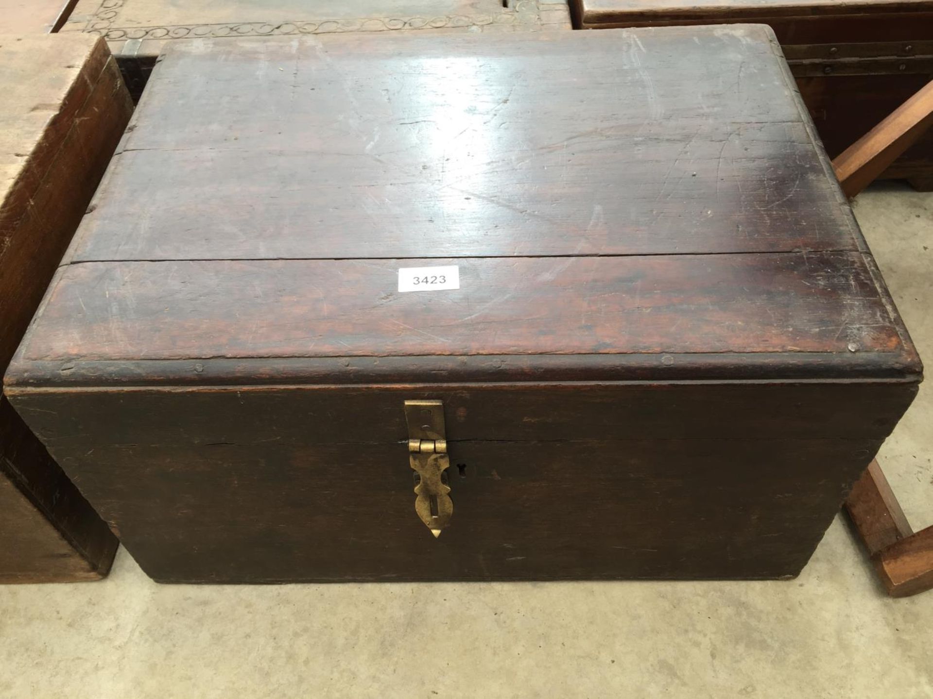AN INDIAN HARDWOOD WRITING BOX WITH BRASS FITTINGS, 21" WIDE