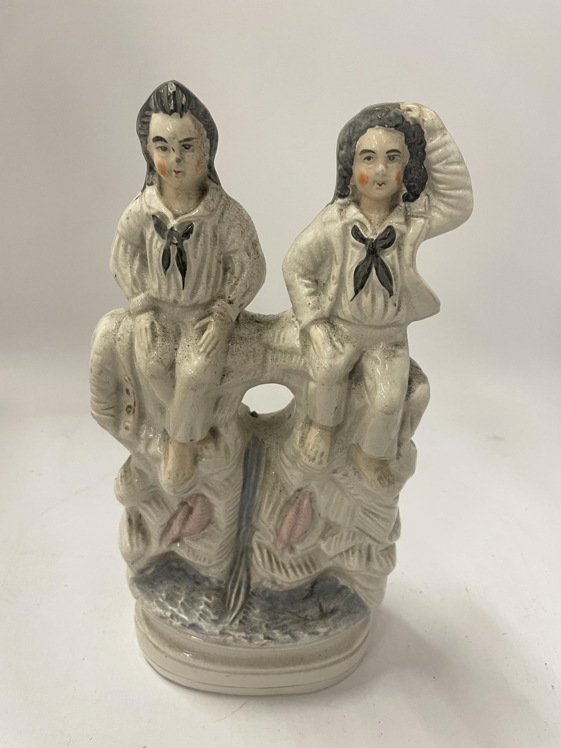 A STAFFORDSHIRE TWINS BY THE WATER FIGURE