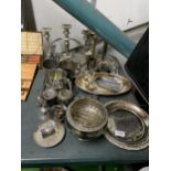 A LARGE QUANTITY OF SILVER PLATE TO INCLUDE A ROSE BOWL, CANDLEABRA, MINIATURE TEAPOT, TRAYS,