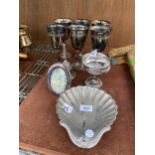 AN ASSORTMENT OF METAL WARE ITEMS TO INCLUDE WINE GOBLETS AND A SHELL SHAPED DISH ETC