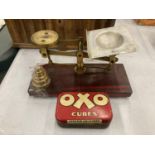 A SET OF VINTAGE EGG GRADING SCALES COMPLETE WITH BRASS WEIGHTS