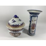 TWO CONTINENTAL PORCELAIN ITEMS TO INCLUDE A LIDDED POT AND SAMSON STYLE TRUMPET VASE, A/F