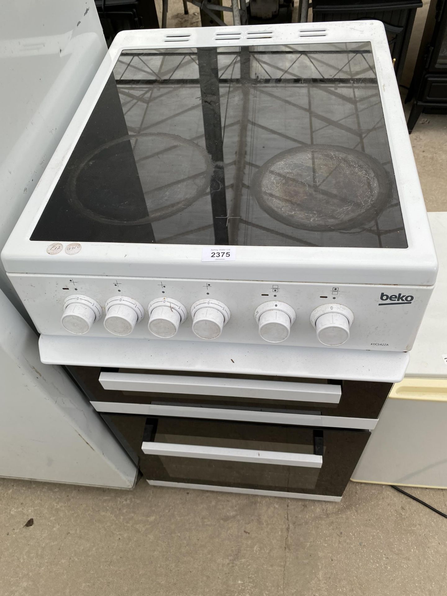 A WHITE BEKO FREESTANDING ELECTRIC OVEN AND HOB BELIEVED WORKING BUT NO WARRANTY